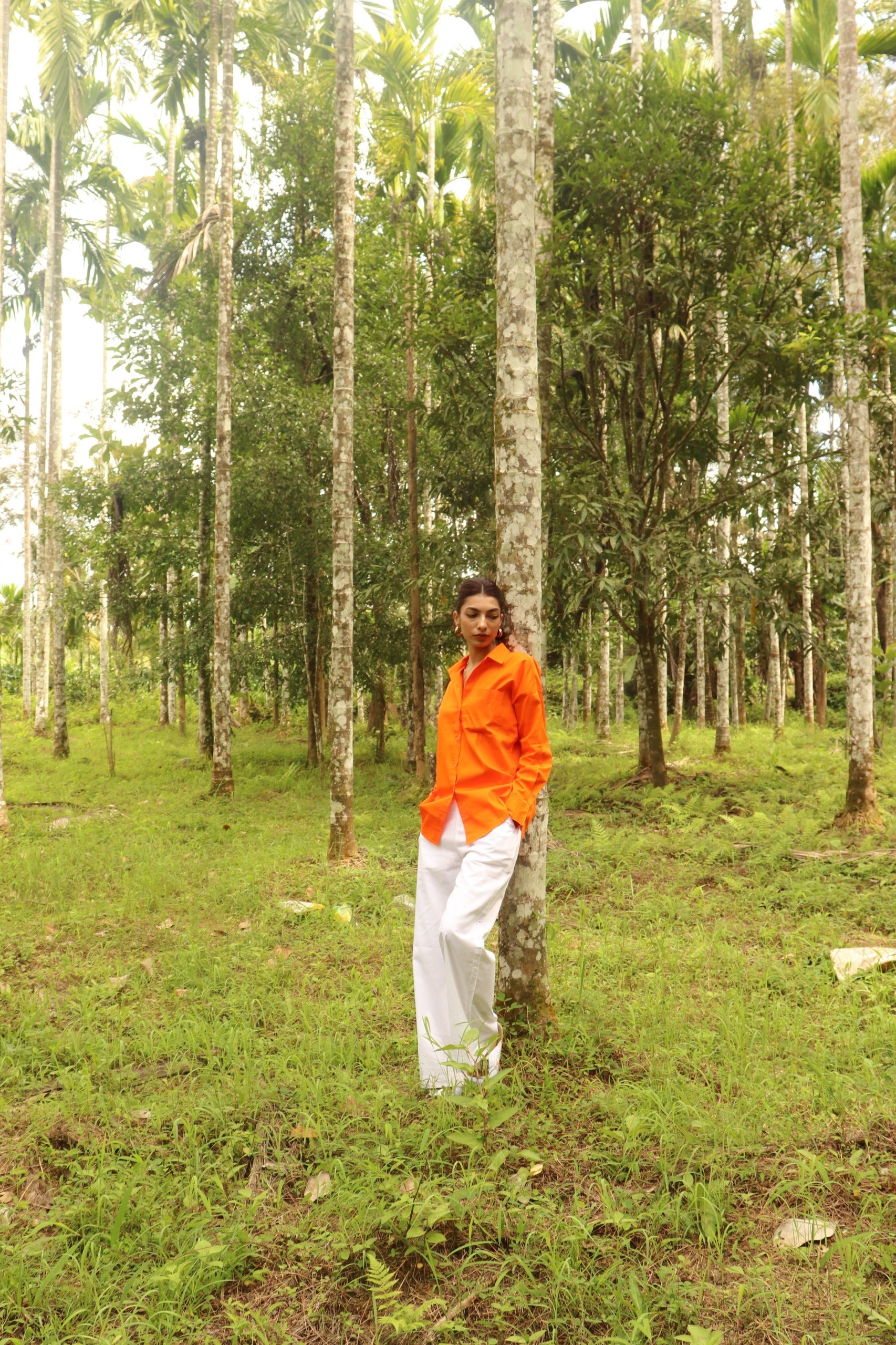 Orange shirt with white Pants